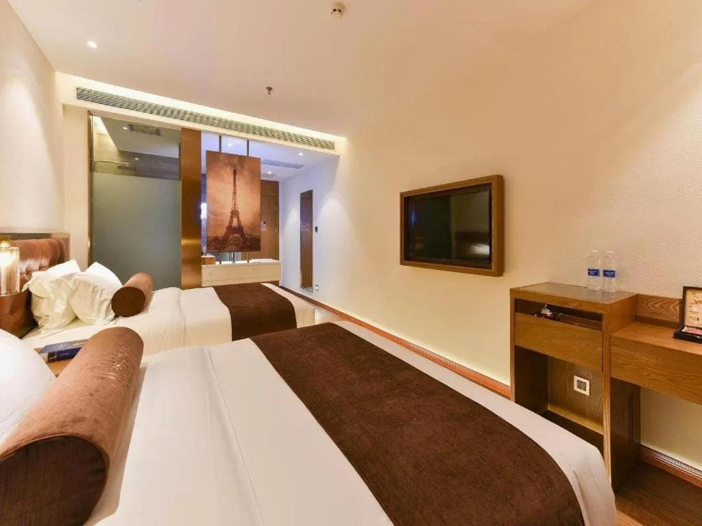 Bed in James Joyce Coffetel Shijiazhuang the Mixc Jinyuan Tower Airport Bus