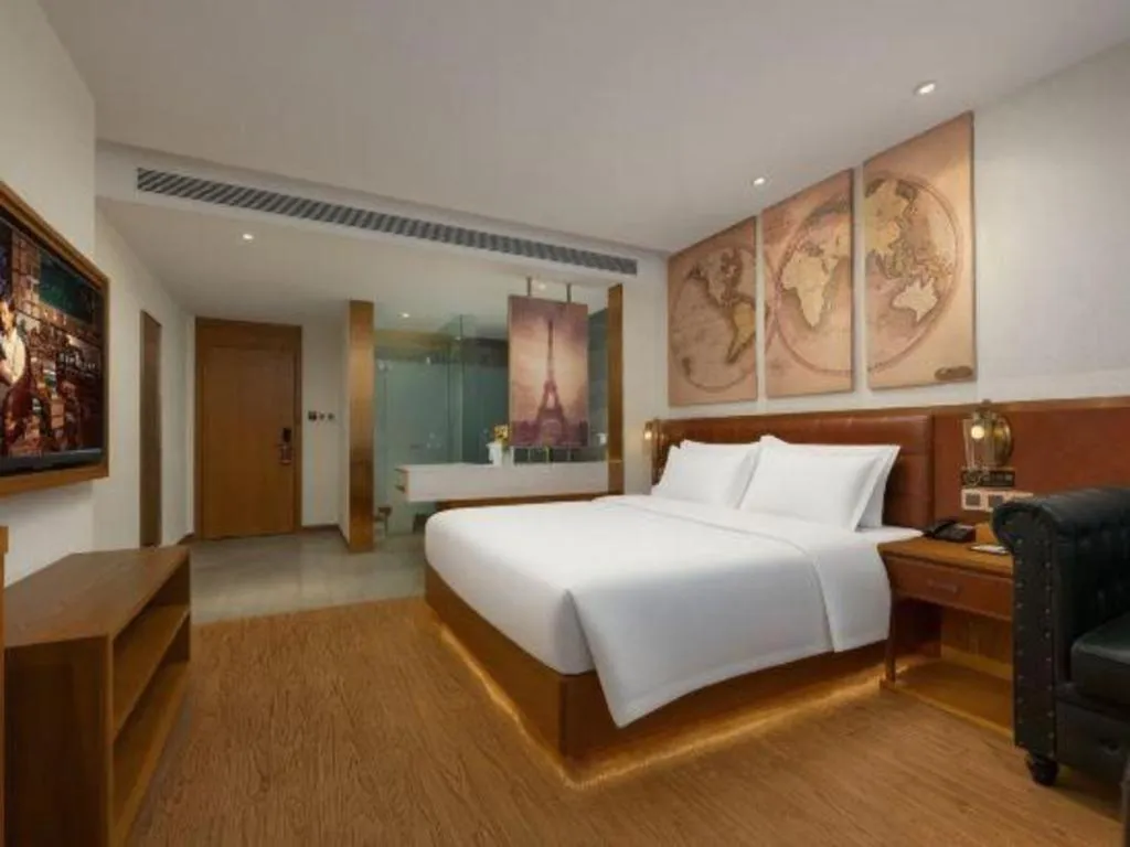 Bed in James Joyce Coffetel Shijiazhuang the Mixc Jinyuan Tower Airport Bus