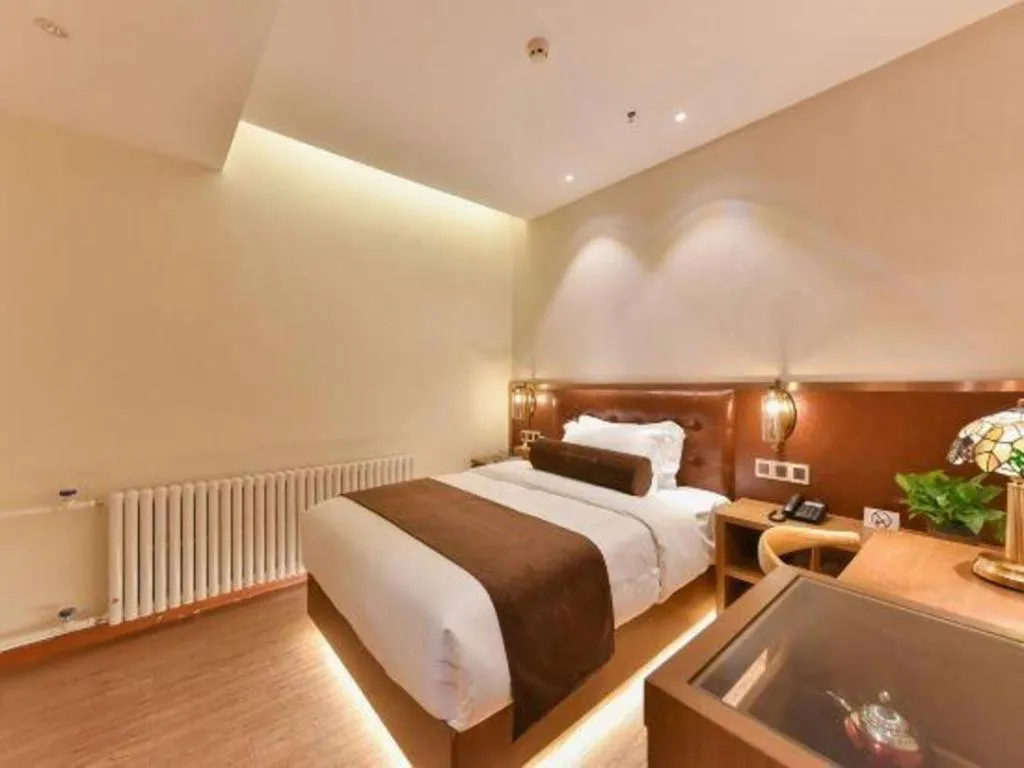 Bed in James Joyce Coffetel Shijiazhuang the Mixc Jinyuan Tower Airport Bus
