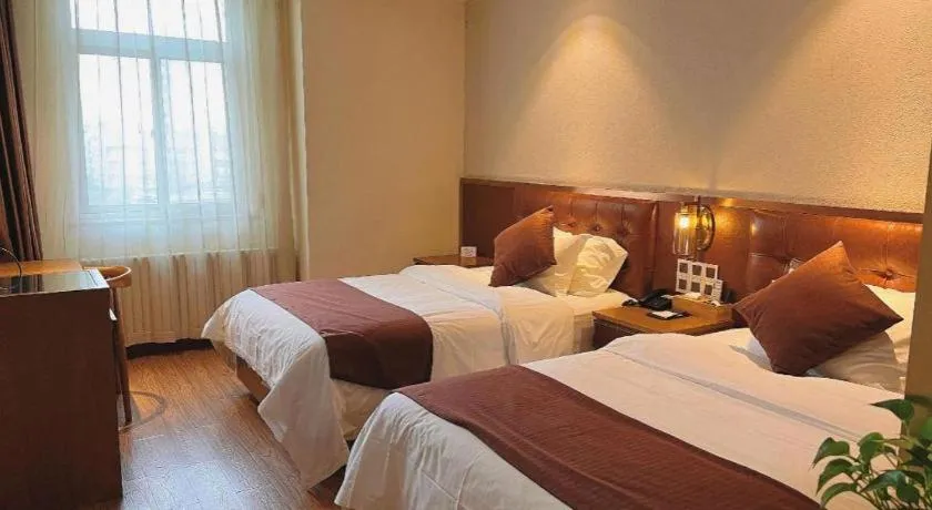 Bed in James Joyce Coffetel Shijiazhuang the Mixc Jinyuan Tower Airport Bus