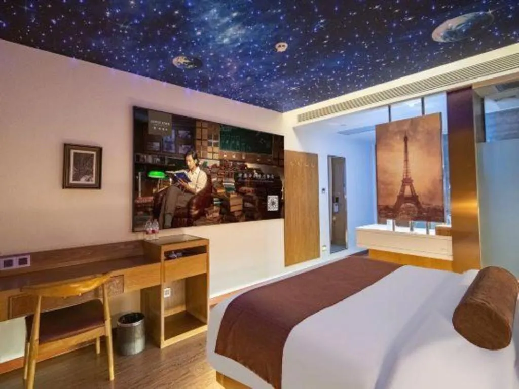 Bed in James Joyce Coffetel Shijiazhuang the Mixc Jinyuan Tower Airport Bus