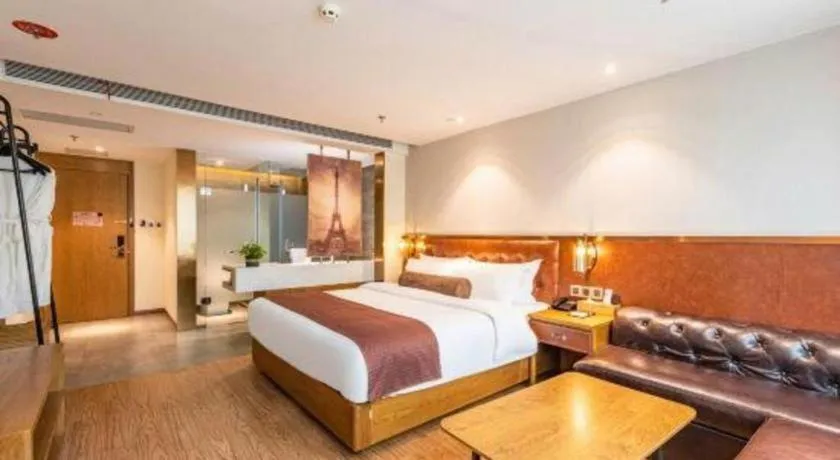 Bed in James Joyce Coffetel Shijiazhuang the Mixc Jinyuan Tower Airport Bus