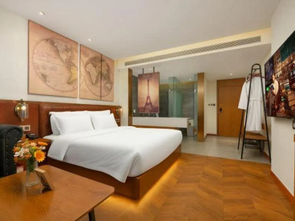 Bed in James Joyce Coffetel Shijiazhuang the Mixc Jinyuan Tower Airport Bus