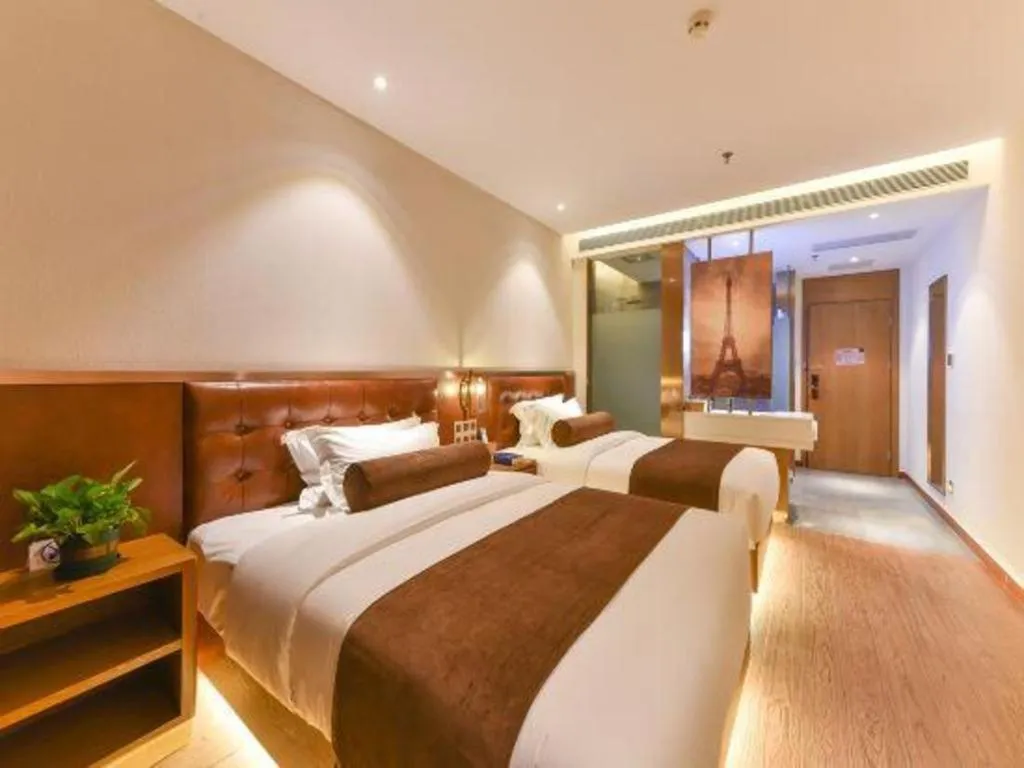 Bed in James Joyce Coffetel Shijiazhuang the Mixc Jinyuan Tower Airport Bus
