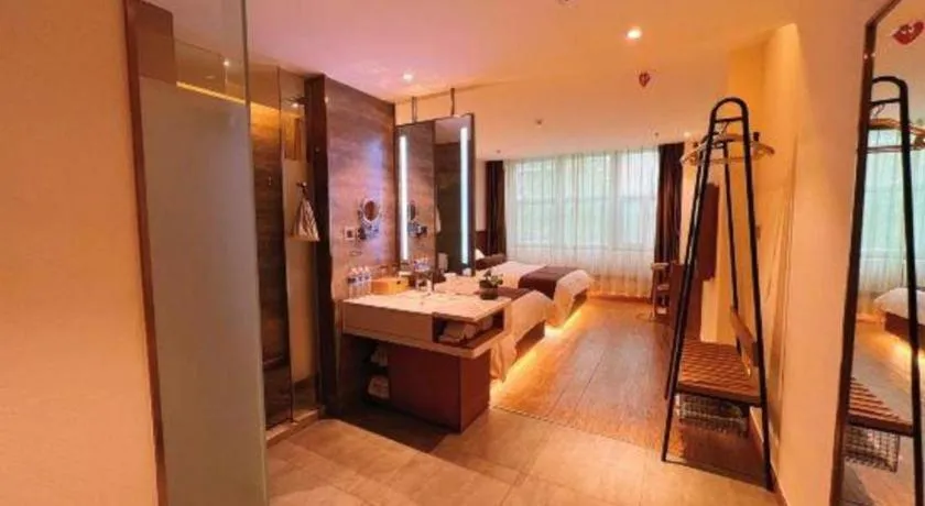 Bed in James Joyce Coffetel Shijiazhuang the Mixc Jinyuan Tower Airport Bus