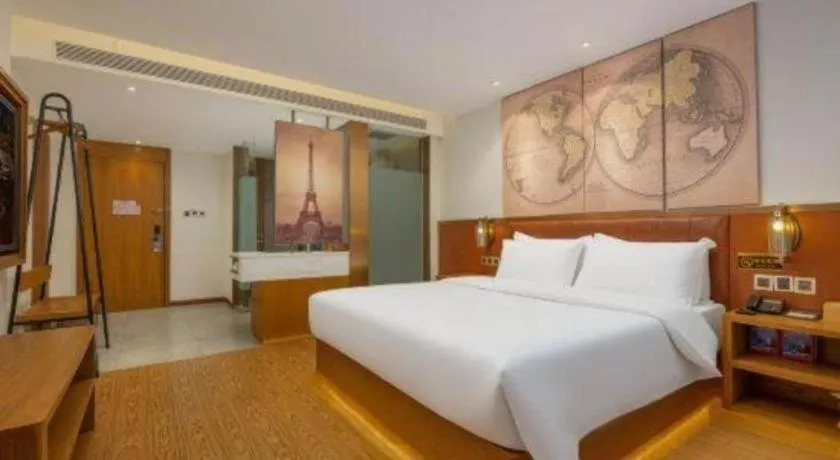 Bed in James Joyce Coffetel Shijiazhuang the Mixc Jinyuan Tower Airport Bus