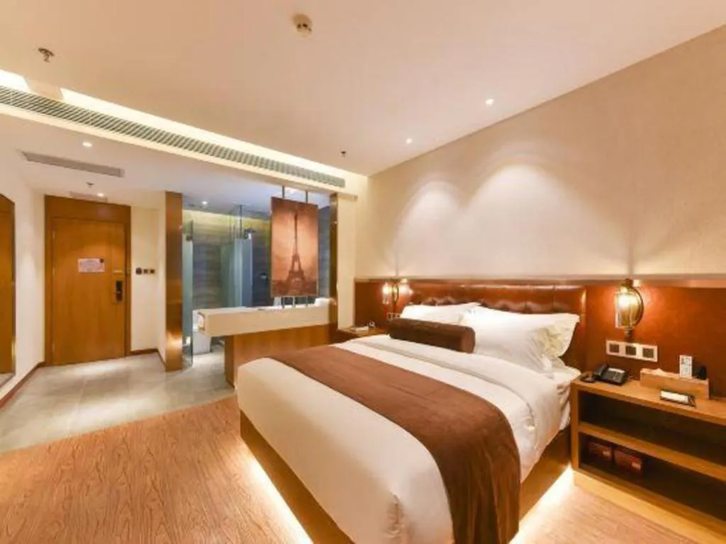 Bed in James Joyce Coffetel Shijiazhuang the Mixc Jinyuan Tower Airport Bus