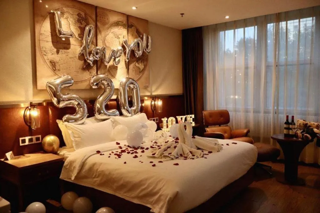 Bed in James Joyce Coffetel Shijiazhuang the Mixc Jinyuan Tower Airport Bus