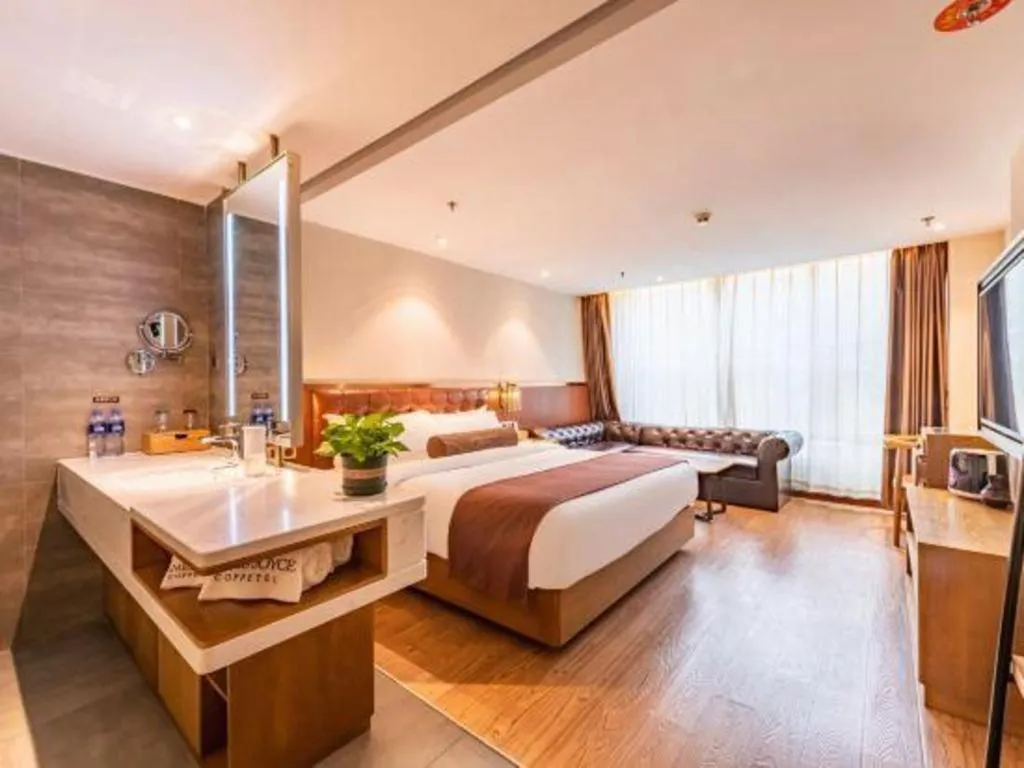 Bed in James Joyce Coffetel Shijiazhuang the Mixc Jinyuan Tower Airport Bus