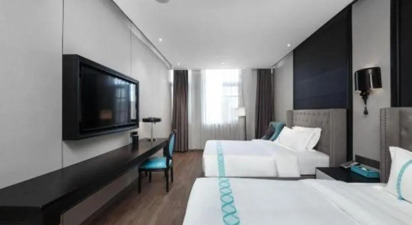 Bed in Xana Hotelle Luzhou High-Speed Railway Station Trading Market Passenger Terminal