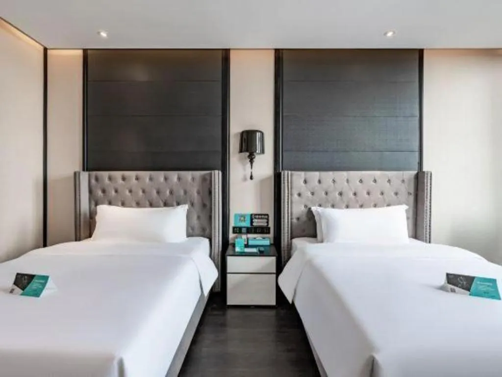 Bed in Xana Hotelle Luzhou High-Speed Railway Station Trading Market Passenger Terminal