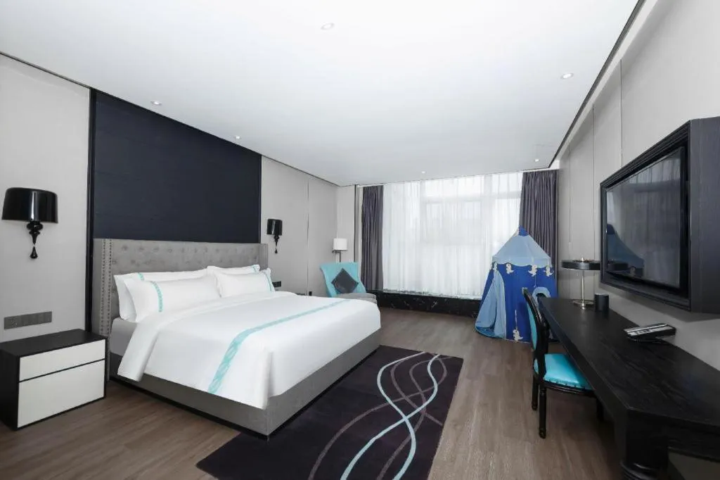 Bed in Xana Hotelle Luzhou High-Speed Railway Station Trading Market Passenger Terminal