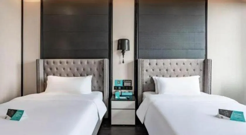 Bed in Xana Hotelle Luzhou High-Speed Railway Station Trading Market Passenger Terminal