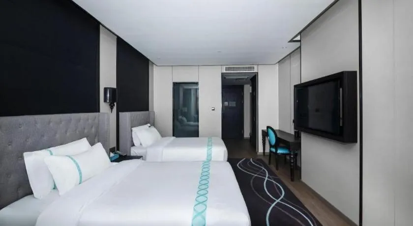 Bed in Xana Hotelle Luzhou High-Speed Railway Station Trading Market Passenger Terminal