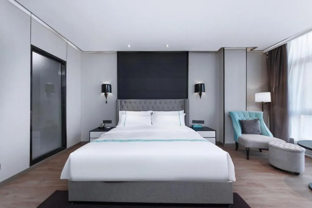 Bed in Xana Hotelle Luzhou High-Speed Railway Station Trading Market Passenger Terminal