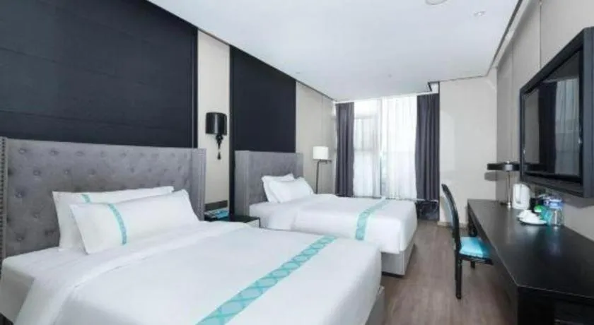 Bed in Xana Hotelle Luzhou High-Speed Railway Station Trading Market Passenger Terminal