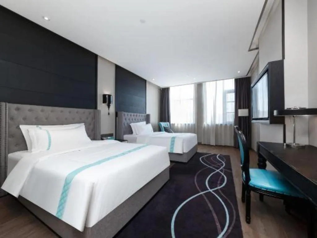 Bed in Xana Hotelle Luzhou High-Speed Railway Station Trading Market Passenger Terminal