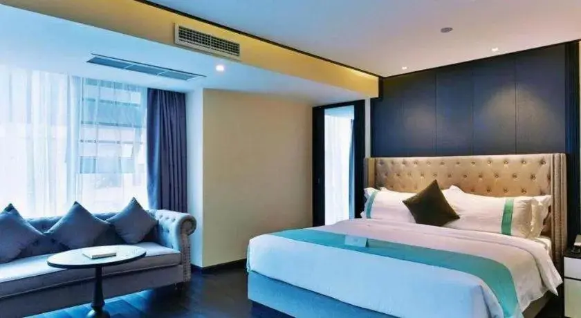 Bed in Xana Hotelle Luzhou High-Speed Railway Station Trading Market Passenger Terminal Bed in Xana Hotelle Luzhou High-Speed Railway Station Trading Market Passenger Terminal