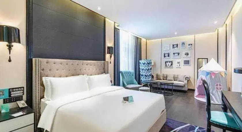 Bed in Xana Hotelle Luzhou High-Speed Railway Station Trading Market Passenger Terminal Bed in Xana Hotelle Luzhou High-Speed Railway Station Trading Market Passenger Terminal