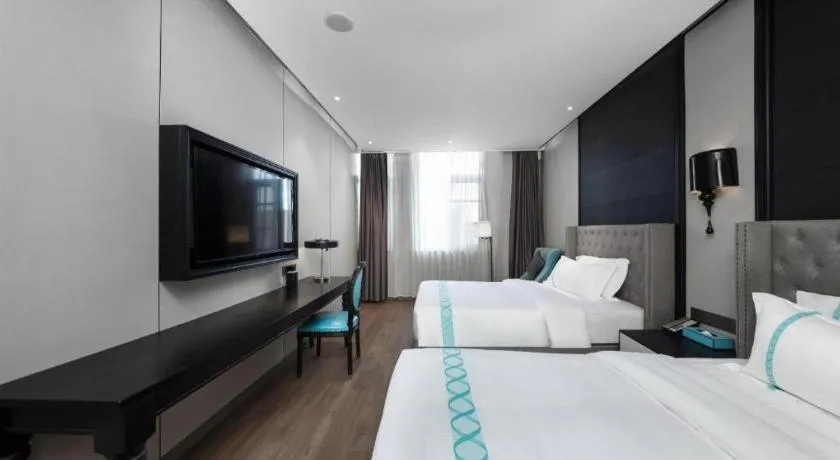 Bed in Xana Hotelle Luzhou High-Speed Railway Station Trading Market Passenger Terminal