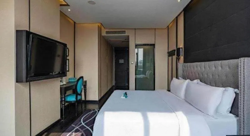 Bed in Xana Hotelle Luzhou High-Speed Railway Station Trading Market Passenger Terminal