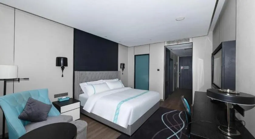 Bed in Xana Hotelle Luzhou High-Speed Railway Station Trading Market Passenger Terminal