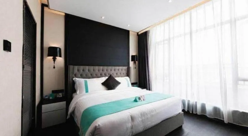 Bed in Xana Hotelle Luzhou High-Speed Railway Station Trading Market Passenger Terminal