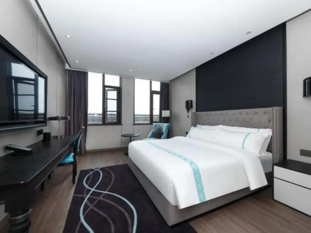 Bed in Xana Hotelle Luzhou High-Speed Railway Station Trading Market Passenger Terminal