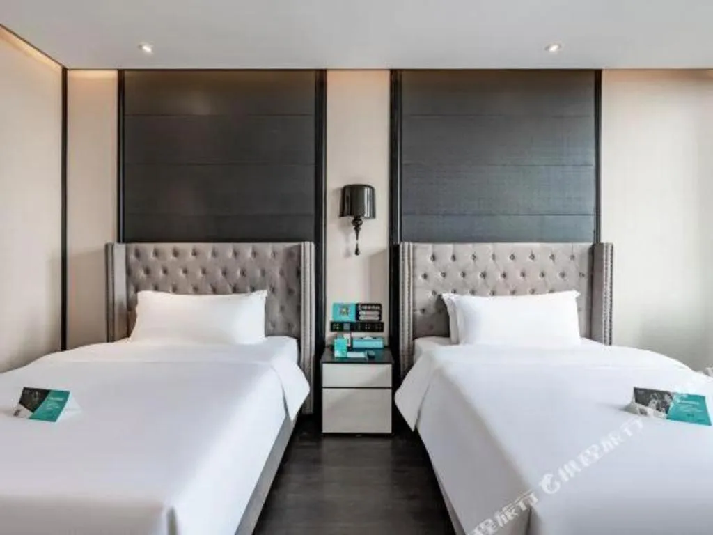 Bed in Xana Hotelle Luzhou High-Speed Railway Station Trading Market Passenger Terminal