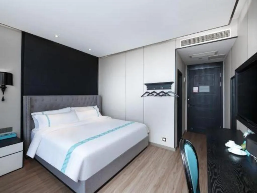 Bed in Xana Hotelle Luzhou High-Speed Railway Station Trading Market Passenger Terminal