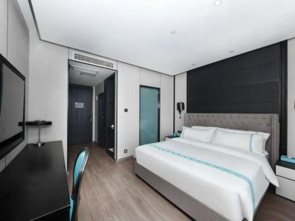 Bed in Xana Hotelle Luzhou High-Speed Railway Station Trading Market Passenger Terminal