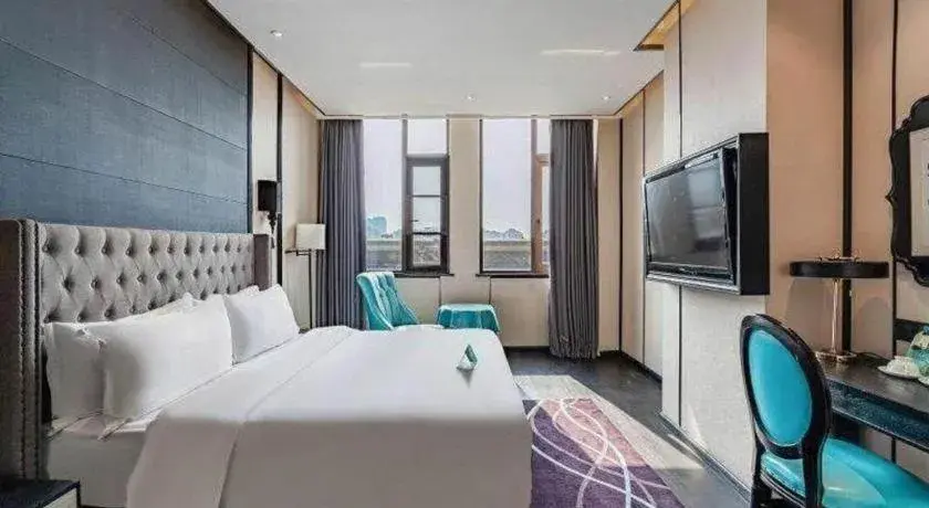 Bed in Xana Hotelle Luzhou High-Speed Railway Station Trading Market Passenger Terminal Bed in Xana Hotelle Luzhou High-Speed Railway Station Trading Market Passenger Terminal