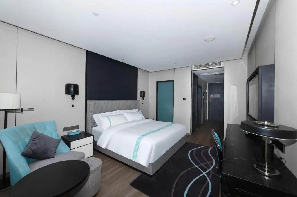 Bed in Xana Hotelle Luzhou High-Speed Railway Station Trading Market Passenger Terminal