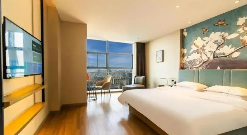 Bed in Magnotel Tongxiang Shimao Center Bed in Magnotel Tongxiang Shimao Center