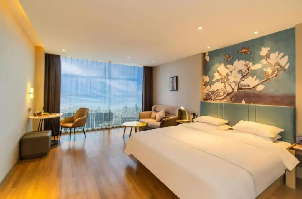 Bed in Magnotel Tongxiang Shimao Center Bed in Magnotel Tongxiang Shimao Center