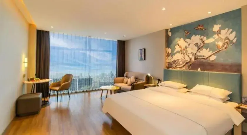 Bed in Magnotel Tongxiang Shimao Center Bed in Magnotel Tongxiang Shimao Center