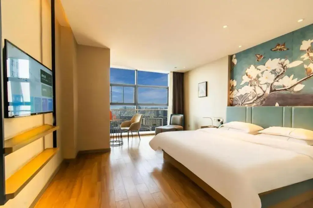 Bed in Magnotel Tongxiang Shimao Center Bed in Magnotel Tongxiang Shimao Center