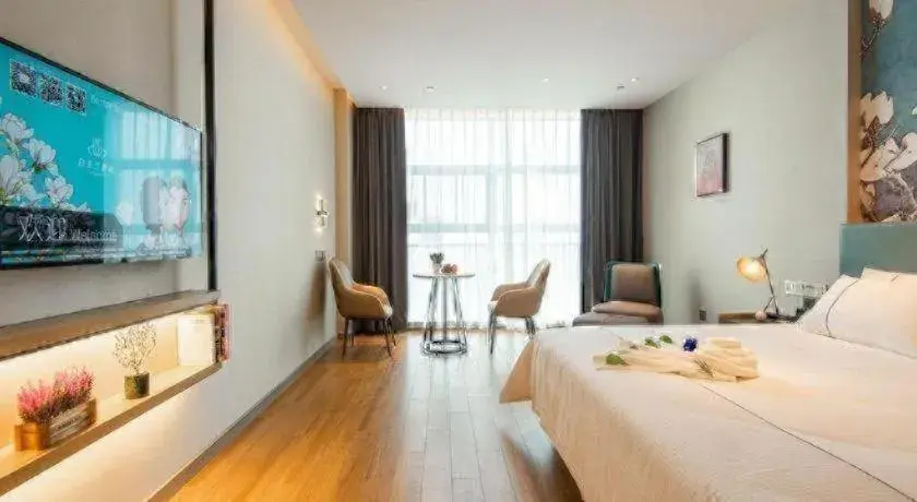 Bed in Magnotel Tongxiang Shimao Center Bed in Magnotel Tongxiang Shimao Center