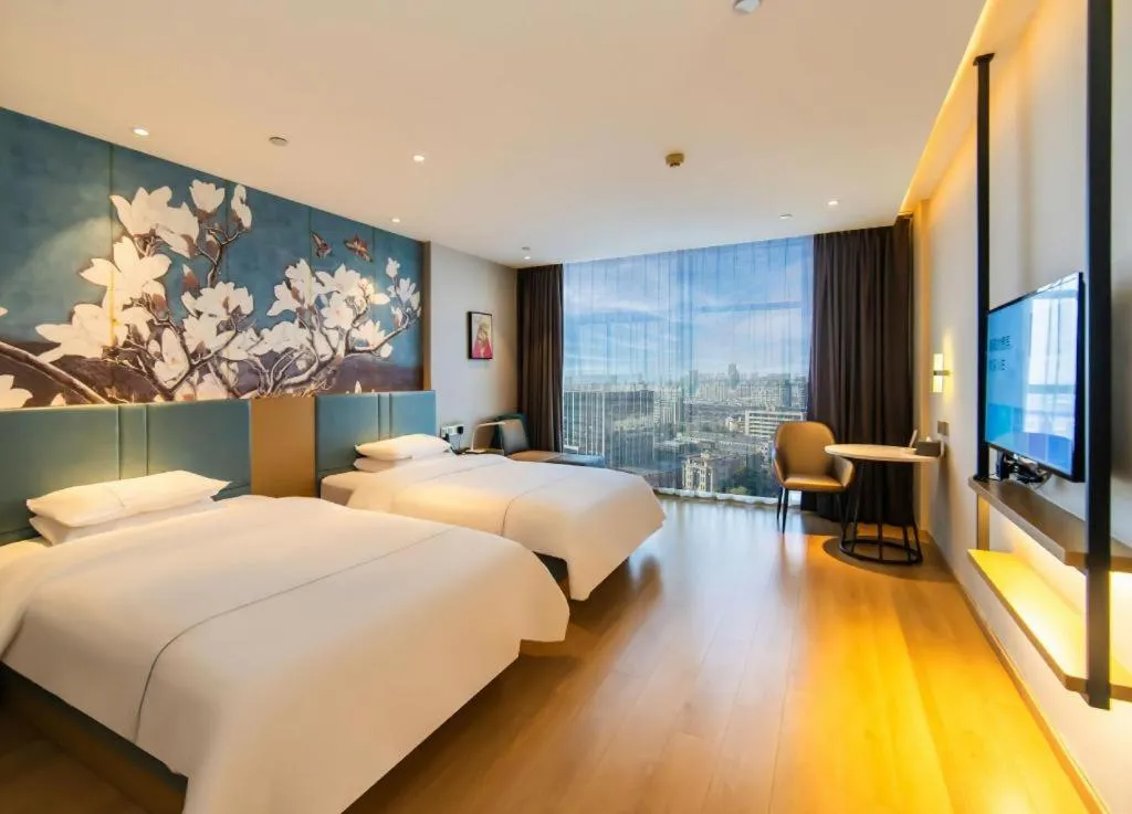 Bed in Magnotel Tongxiang Shimao Center