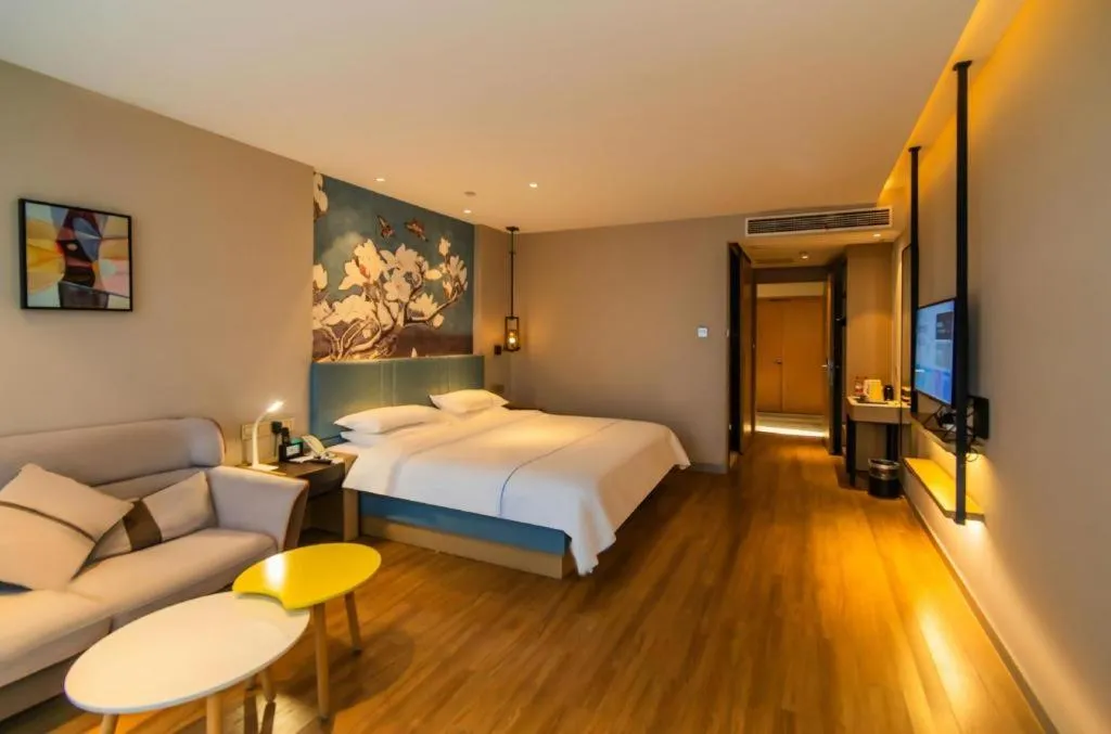 Bed in Magnotel Tongxiang Shimao Center