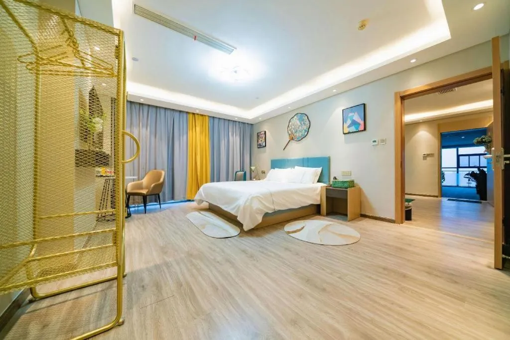 Bed in Magnotel Tongxiang Shimao Center