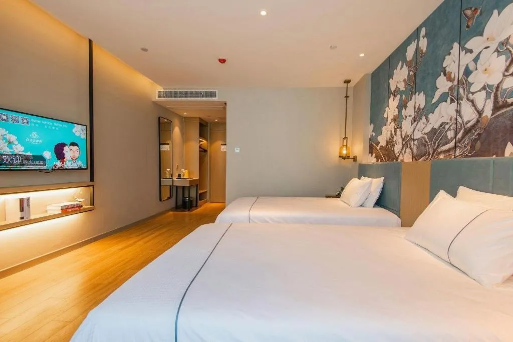 Bed in Magnotel Tongxiang Shimao Center