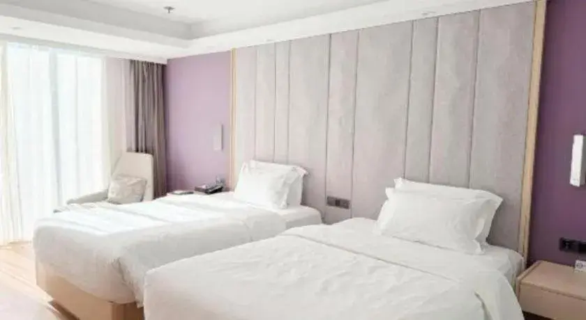 Bed in Lavande Hotel Beijing Fangshan Changyang Metro Station Bed in Lavande Hotel Beijing Fangshan Changyang Metro Station