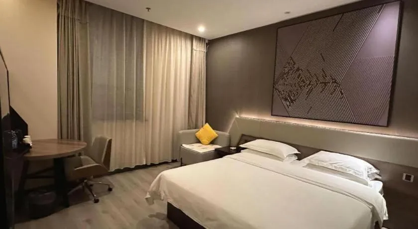 Bed in IU Hotels· Wuhan Jianghan Road Metro Station