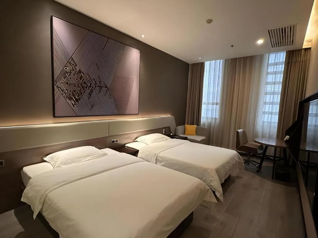 Bed in IU Hotels· Wuhan Jianghan Road Metro Station