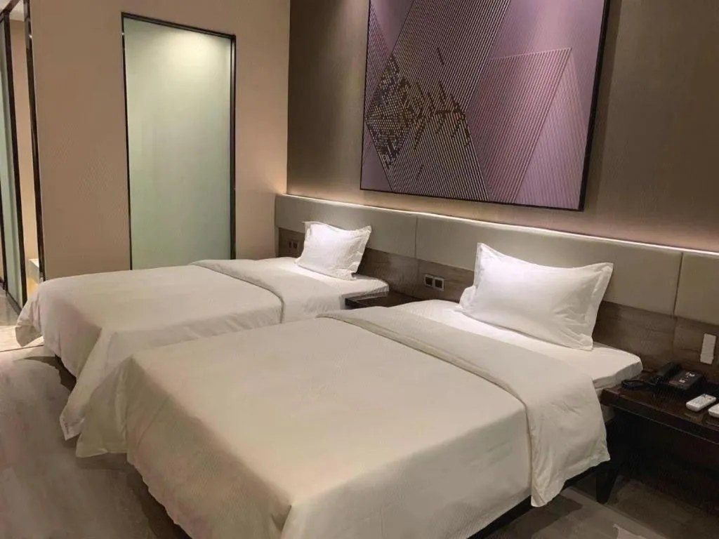 Bed in IU Hotels· Wuhan Jianghan Road Metro Station