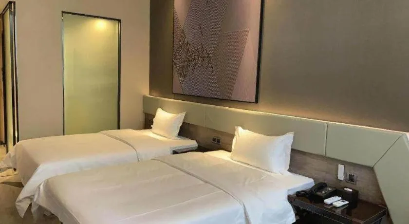 Bed in IU Hotels· Wuhan Jianghan Road Metro Station