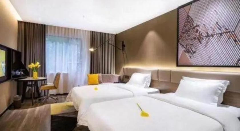 Bed in IU Hotels· Wuhan Jianghan Road Metro Station