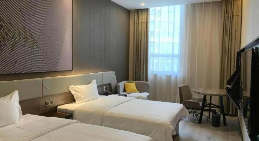 Bed in IU Hotels· Wuhan Jianghan Road Metro Station
