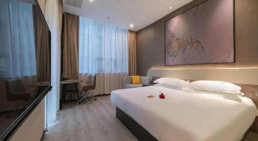 Bed in IU Hotels· Wuhan Jianghan Road Metro Station